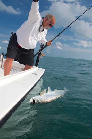 Holding a Key West tarpon